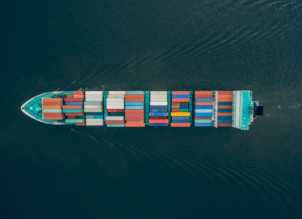 Top view of container vessel in the sea